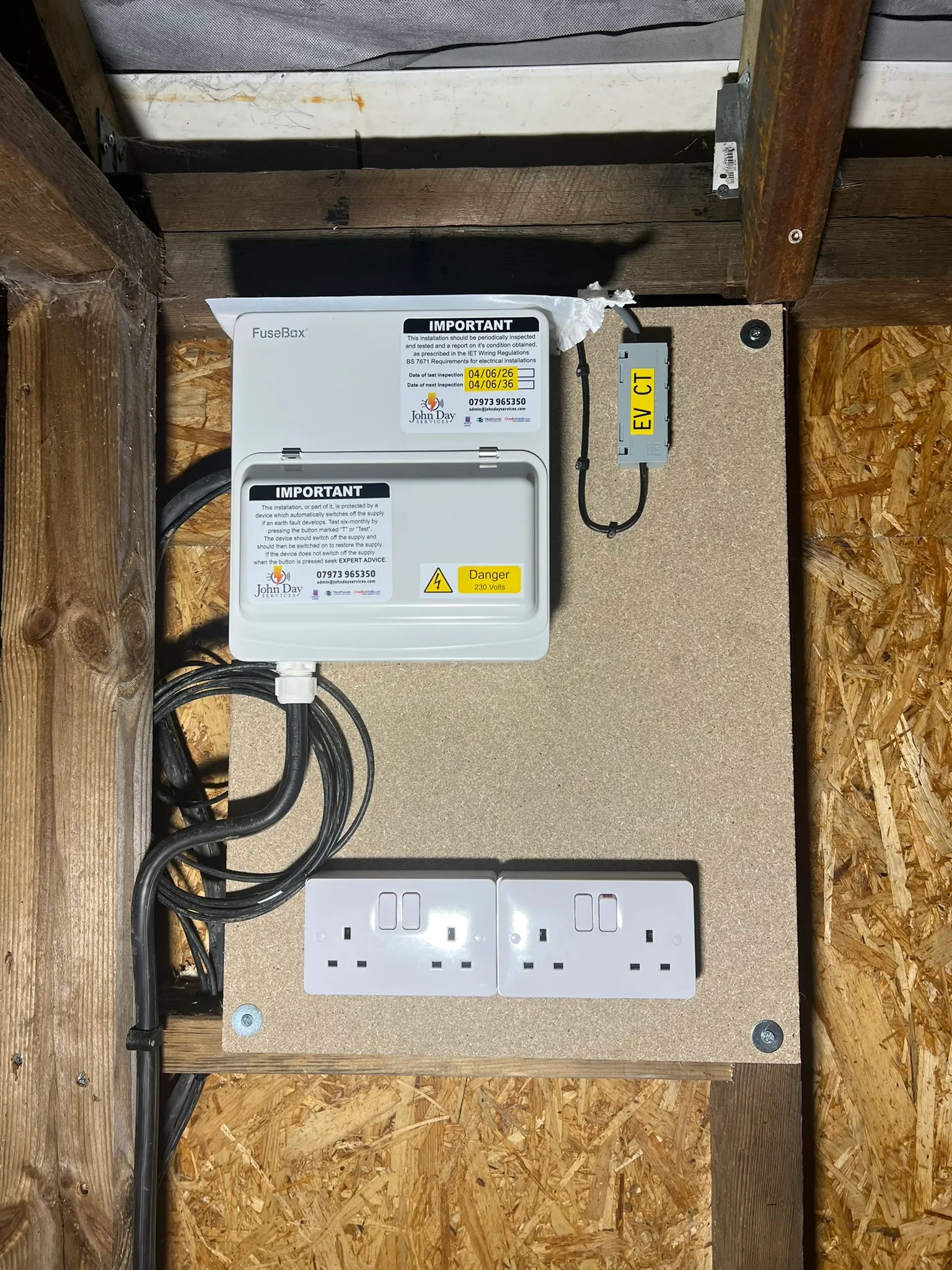 Two double sockets on the wall of a garden room